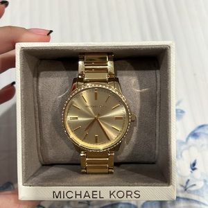Michael Kors women’s gold watch